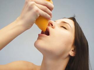 nude teen drinking grapefruit juice